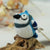 Handmade needle felted blue jay wool ornament by Woolbuddy